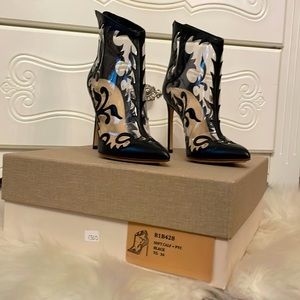 Black never worn leather booties by Francesco Russo